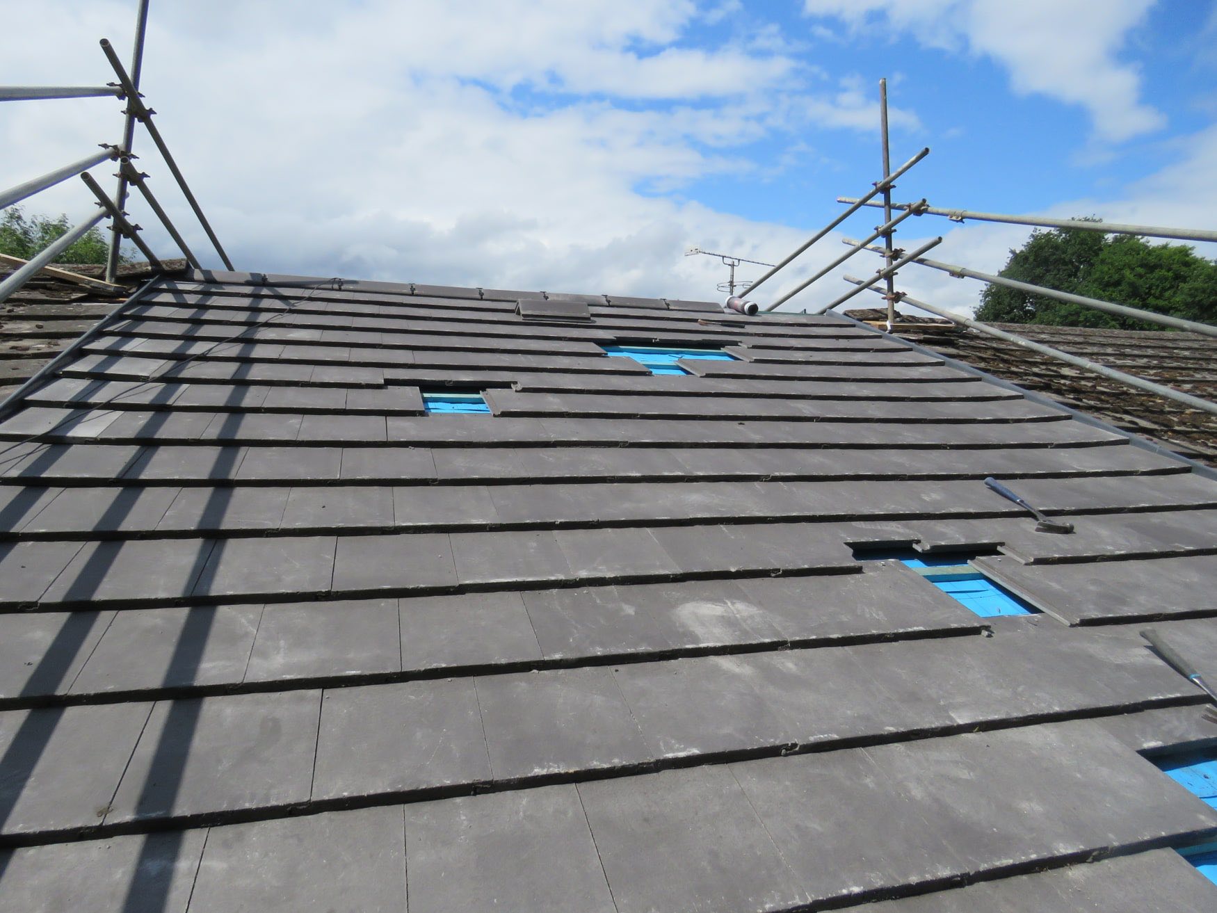 Natural slate roof repair in Budleigh Salterton
